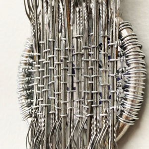 Heddle Medal - woven sculpture